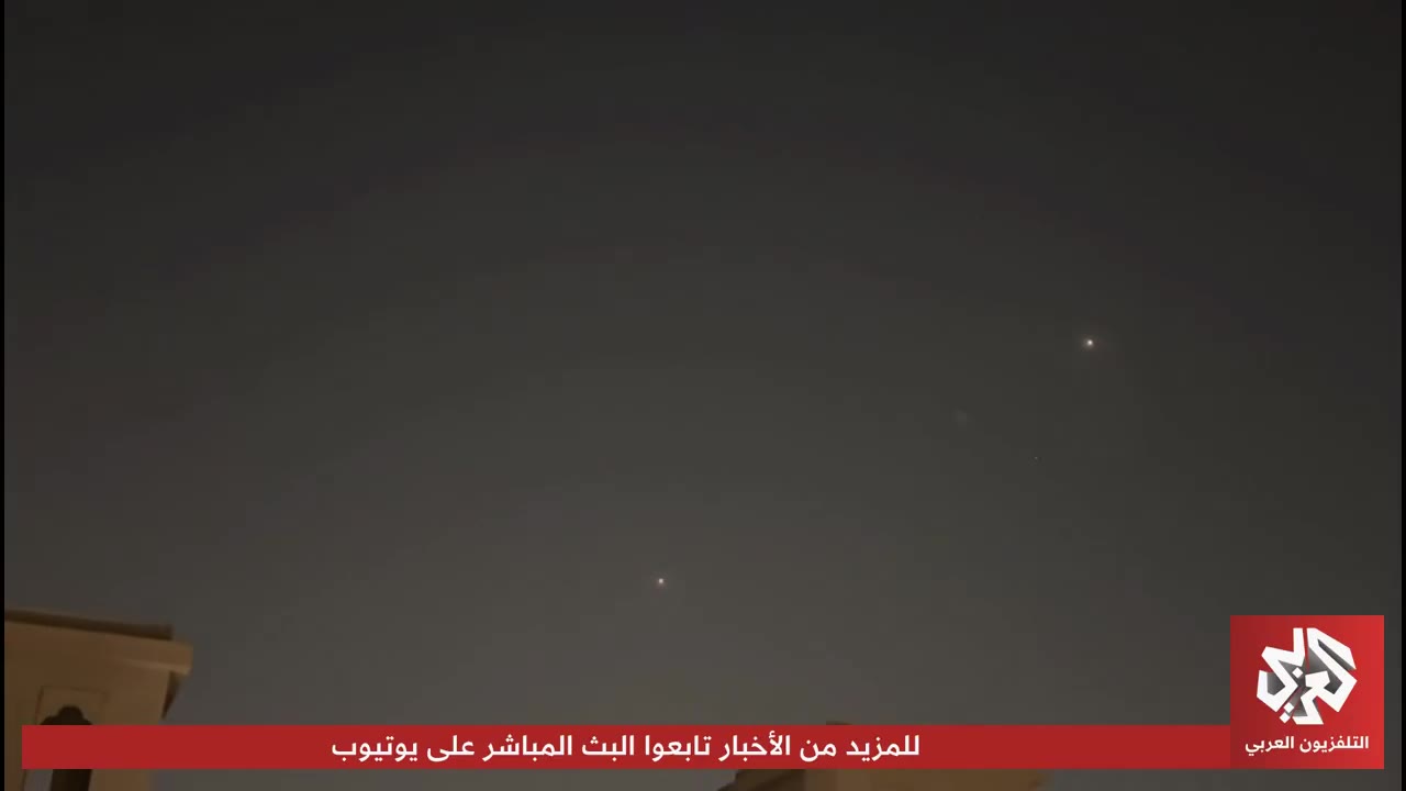 Footage shows air defenses intercepting Iranian missiles in Qatari airspace.