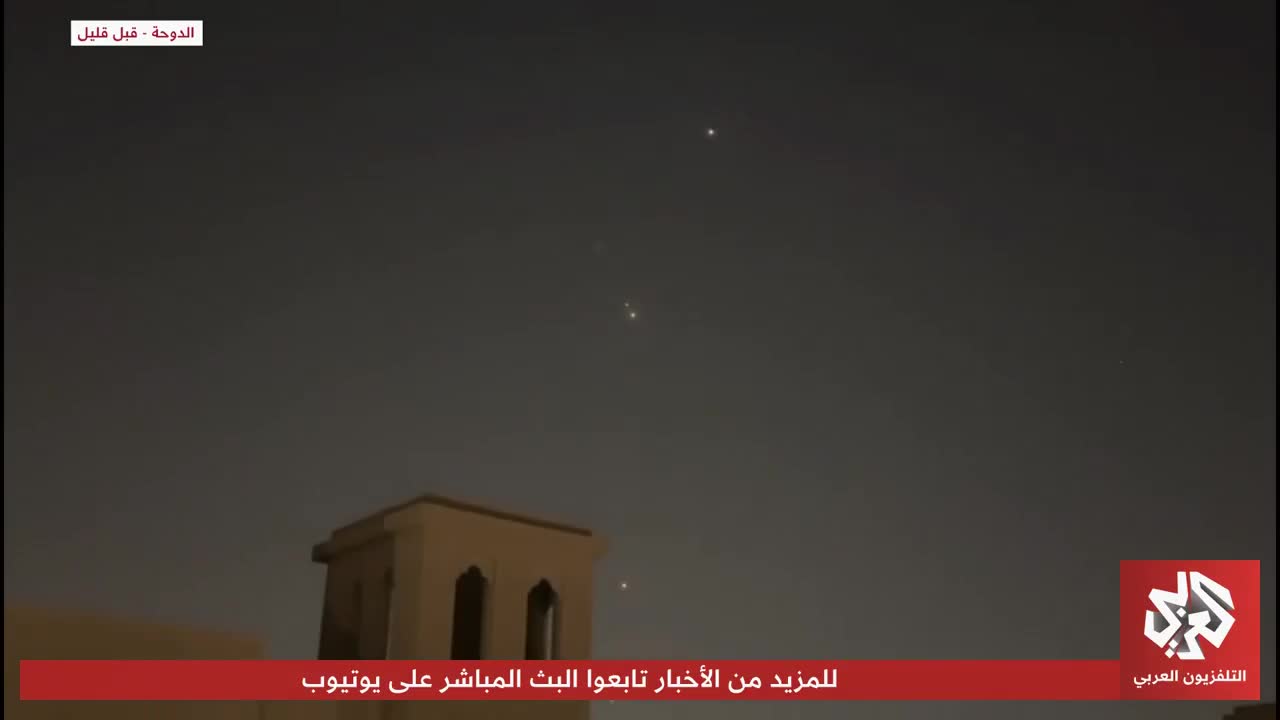 Footage shows air defenses intercepting Iranian missiles in Qatari airspace.