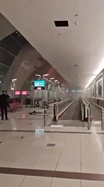 Initial reports of an Iranian drone attack hitting the Dubai International Airport. Evacuations are underway at the airport