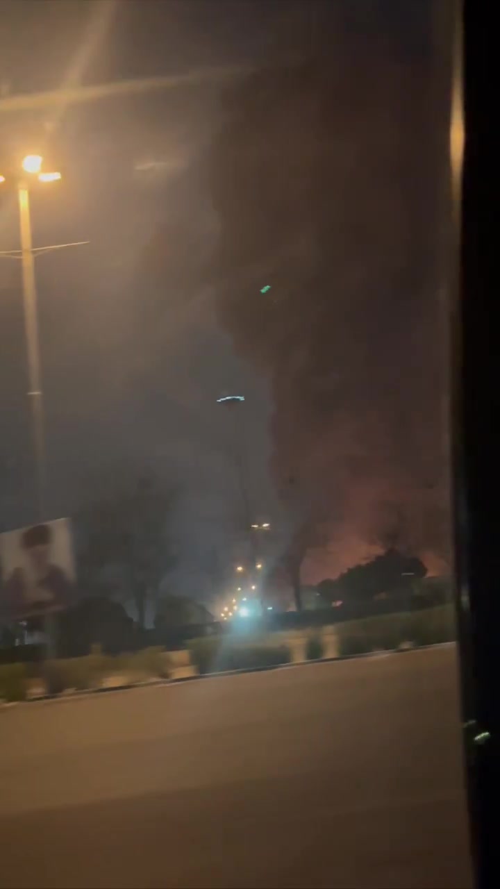 Smoke rising around Azadi Square a few minutes after it was hit