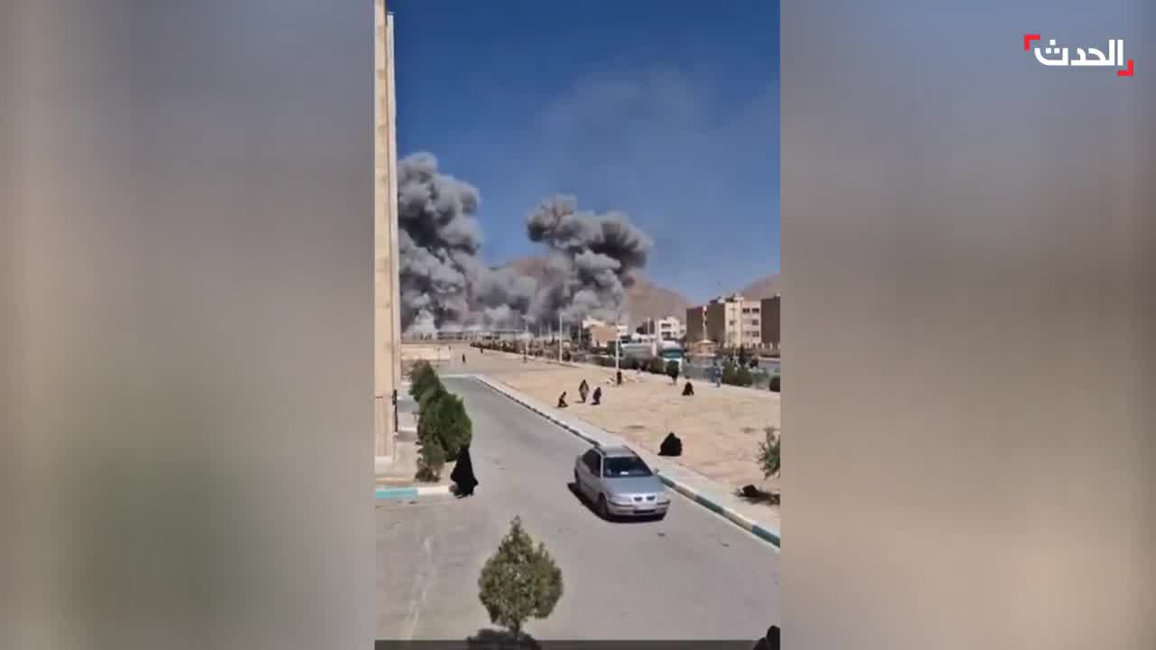 Footage shows the bombing of the Imam Ali barracks in Najafabad, Isfahan province, Iran, by Israeli-American airstrikes. Plumes of smoke rise from the targeted site. 