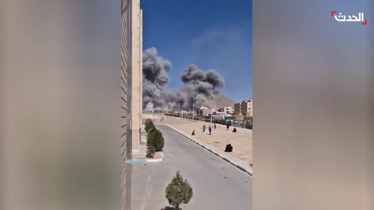 Footage shows the bombing of the Imam Ali barracks in Najafabad, Isfahan province, Iran, by Israeli-American airstrikes. Plumes of smoke rise from the targeted site. 