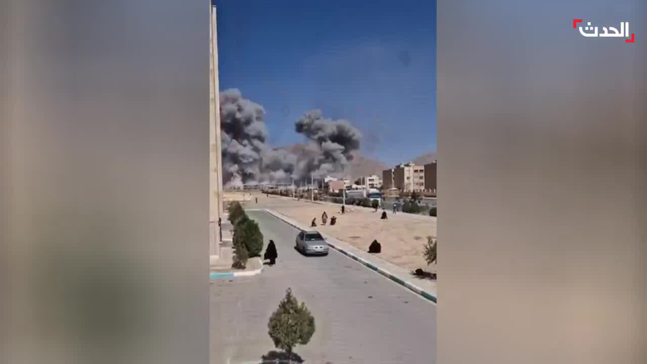 Footage shows the bombing of the Imam Ali barracks in Najafabad, Isfahan province, Iran, by Israeli-American airstrikes. Plumes of smoke rise from the targeted site. 