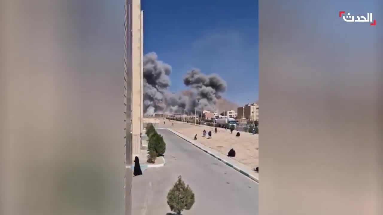 Footage shows the bombing of the Imam Ali barracks in Najafabad, Isfahan province, Iran, by Israeli-American airstrikes. Plumes of smoke rise from the targeted site. 