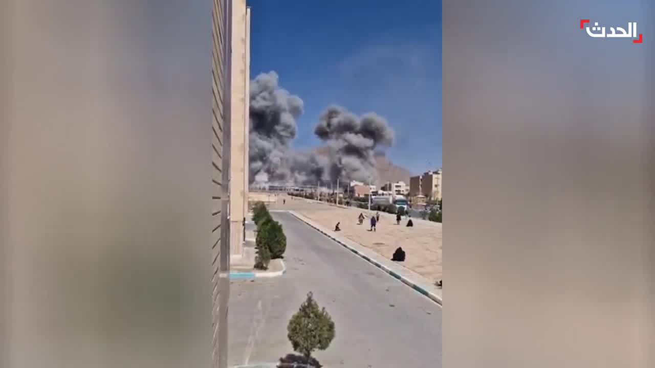 Footage shows the bombing of the Imam Ali barracks in Najafabad, Isfahan province, Iran, by Israeli-American airstrikes. Plumes of smoke rise from the targeted site. 