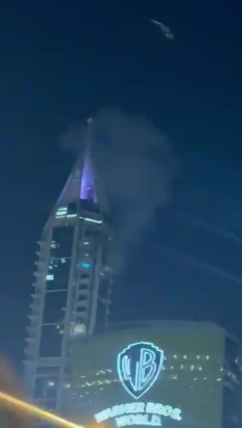 Smoke seen at the 23 Marina skyscraper in Dubai after being hit by debris from an interception. No injuries reported