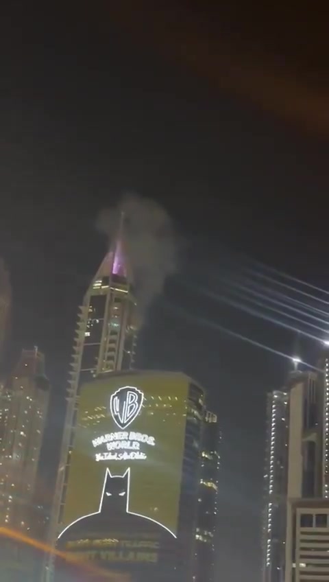 Smoke seen at the 23 Marina skyscraper in Dubai after being hit by debris from an interception. No injuries reported