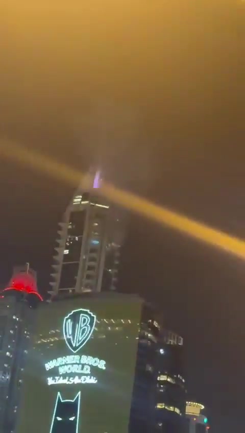 Smoke seen at the 23 Marina skyscraper in Dubai after being hit by debris from an interception. No injuries reported