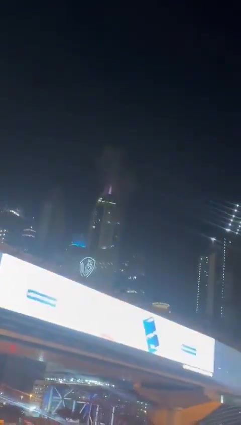 Smoke seen at the 23 Marina skyscraper in Dubai after being hit by debris from an interception. No injuries reported