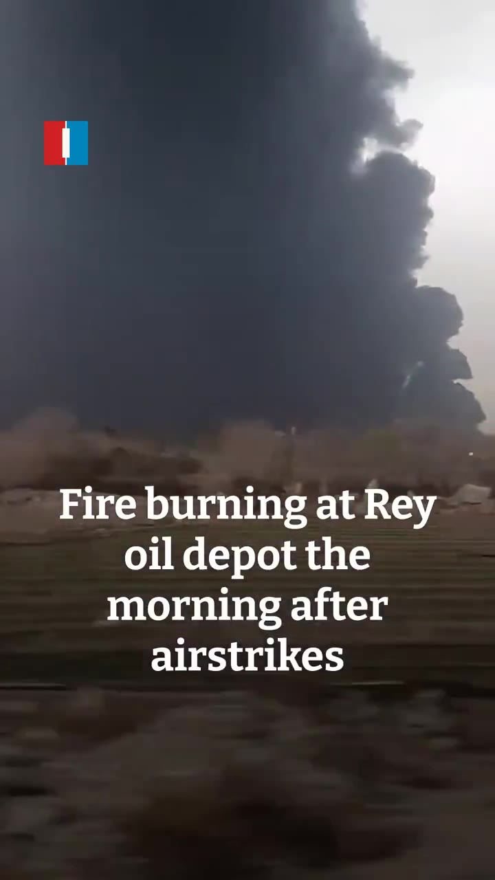 Fire is seen still burning at the Rey oil depot on Sunday morning, hours after the site, along with other oil depots in Tehran, was targeted in airstrikes late on Saturday, footage sent to Iran International shows