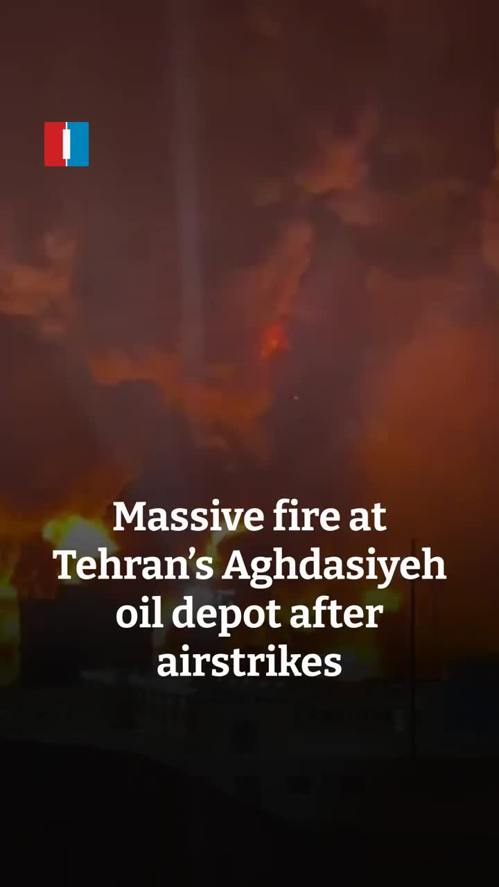 A massive fire is seen burning at Tehran’s Aghdasiyeh oil depot after airstrikes late on Saturday, footage sent to Iran International shows