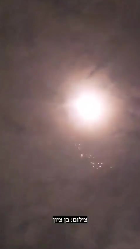 The ballistic missile launched from Iran at central Israel a short while ago carried a cluster bomb warhead, footage shows