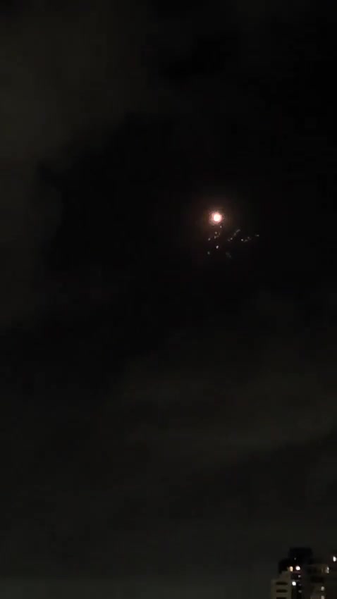 One of the ballistic missiles launched from Iran at northern Israel a short while ago carried a cluster bomb warhead, footage shows