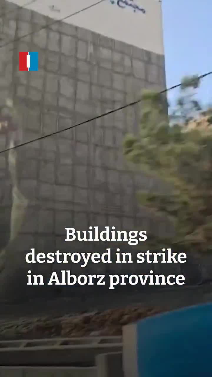 Destroyed buildings were seen in Mohammadshahr in Alborz province after Israeli airstrikes, a video sent to Iran International shows