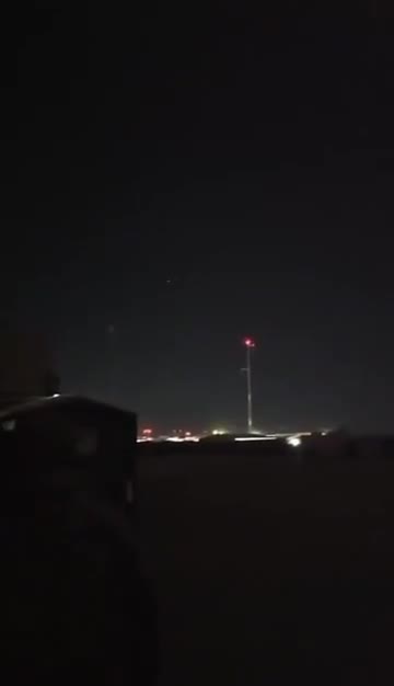 Iranian missile — or its separated warhead — striking a US-used base in Jordan. Two air defense missiles attempt an intercept but miss