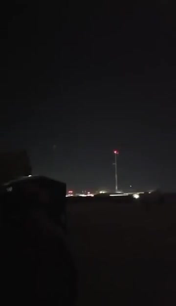 Iranian missile — or its separated warhead — striking a US-used base in Jordan. Two air defense missiles attempt an intercept but miss