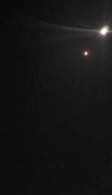 Iranian missile — or its separated warhead — striking a US-used base in Jordan. Two air defense missiles attempt an intercept but miss