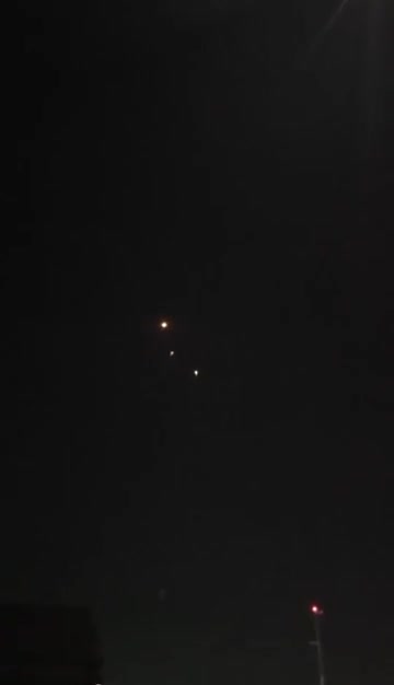 Iranian missile — or its separated warhead — striking a US-used base in Jordan. Two air defense missiles attempt an intercept but miss