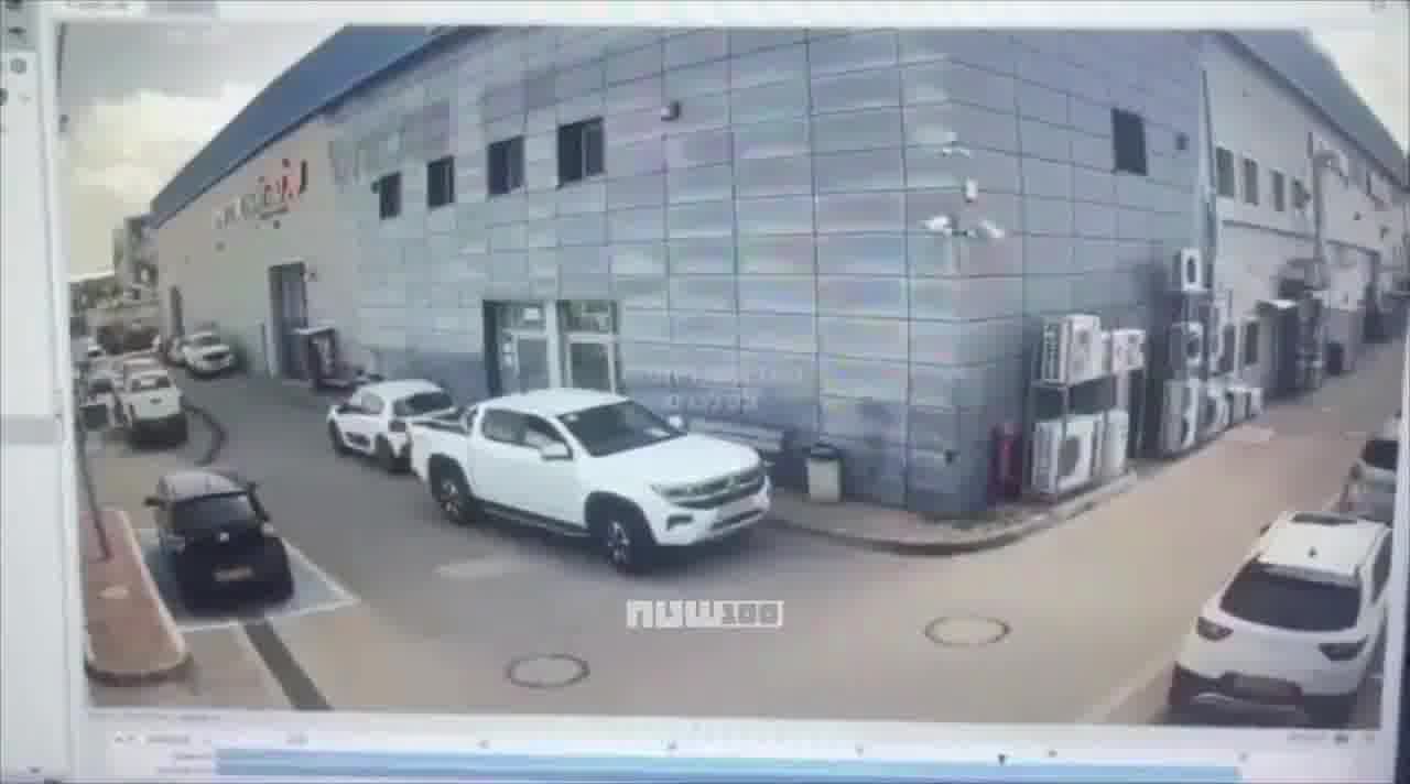 Video shows the moment when cluster submunitions from an Iranian missile struck a commercial area in Petah Tikva, Israel