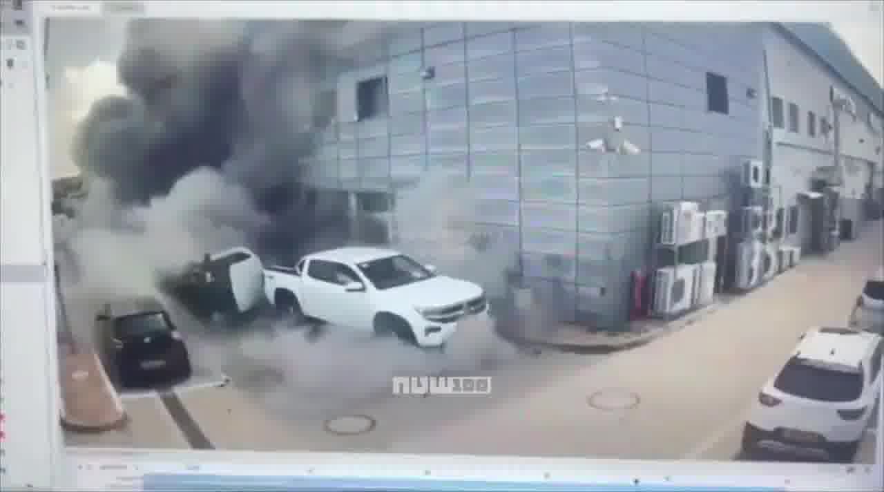 Video shows the moment when cluster submunitions from an Iranian missile struck a commercial area in Petah Tikva, Israel
