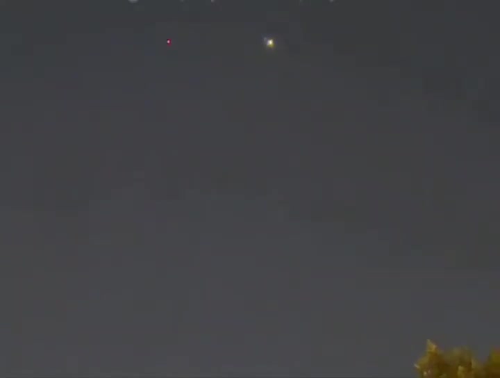 Air defense activity seen over Bahrain’s capital of Manama during tonight’s retaliatory ballistic missile attack by Iran