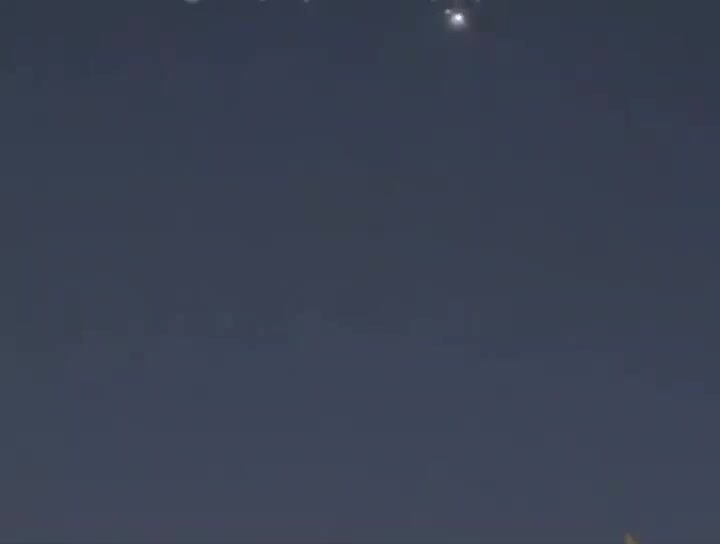 Air defense activity seen over Bahrain’s capital of Manama during tonight’s retaliatory ballistic missile attack by Iran