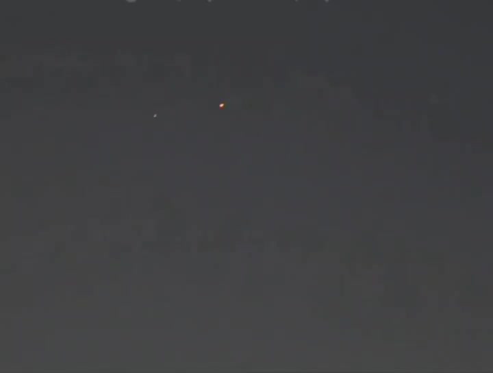 Air defense activity seen over Bahrain’s capital of Manama during tonight’s retaliatory ballistic missile attack by Iran