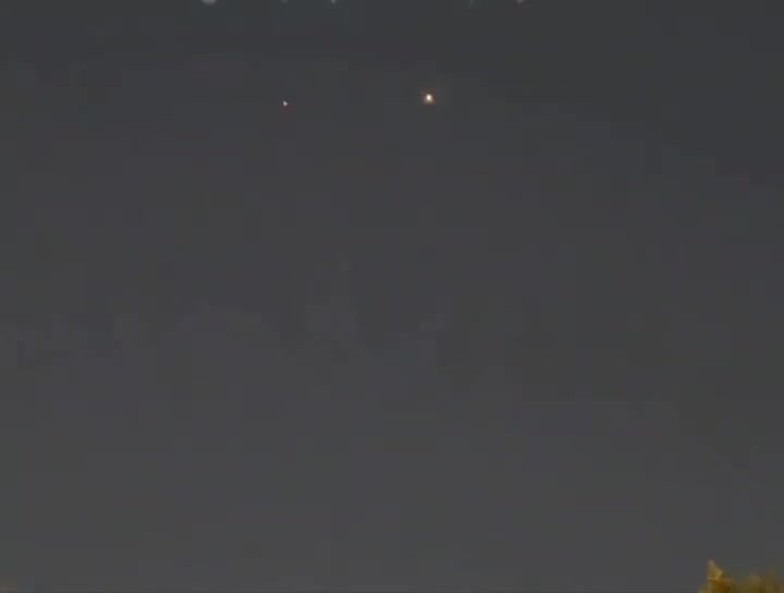 Air defense activity seen over Bahrain’s capital of Manama during tonight’s retaliatory ballistic missile attack by Iran