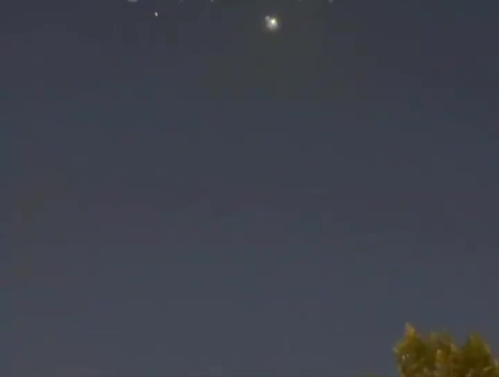 Air defense activity seen over Bahrain’s capital of Manama during tonight’s retaliatory ballistic missile attack by Iran