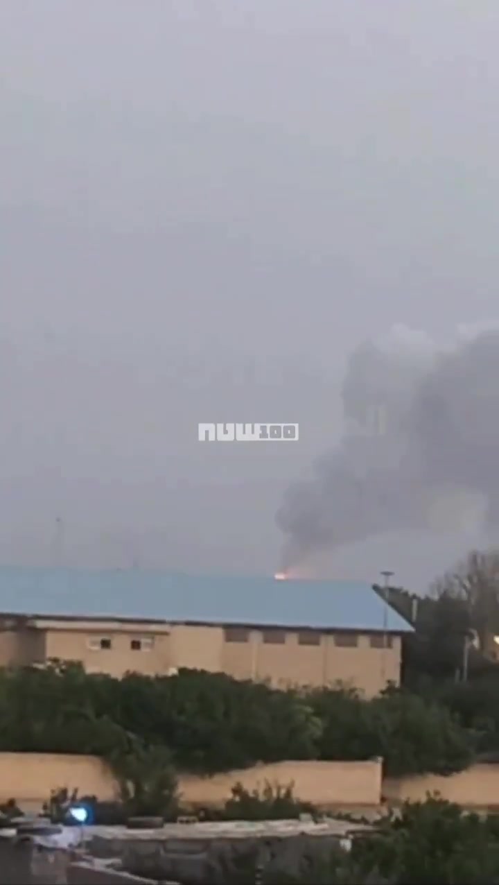 Smoke billows from the reported site of an Israeli strike in Isfahan, Iran