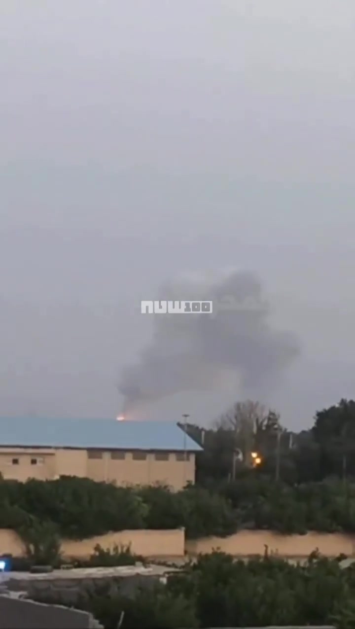 Smoke billows from the reported site of an Israeli strike in Isfahan, Iran