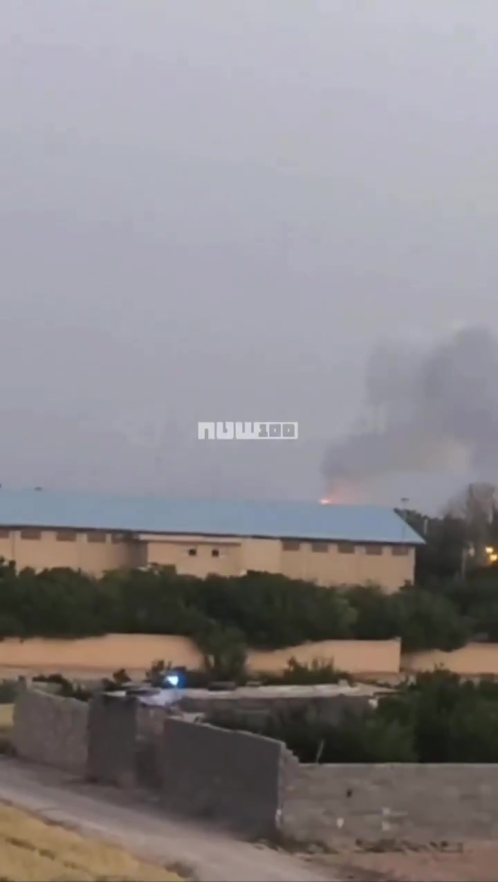 Smoke billows from the reported site of an Israeli strike in Isfahan, Iran