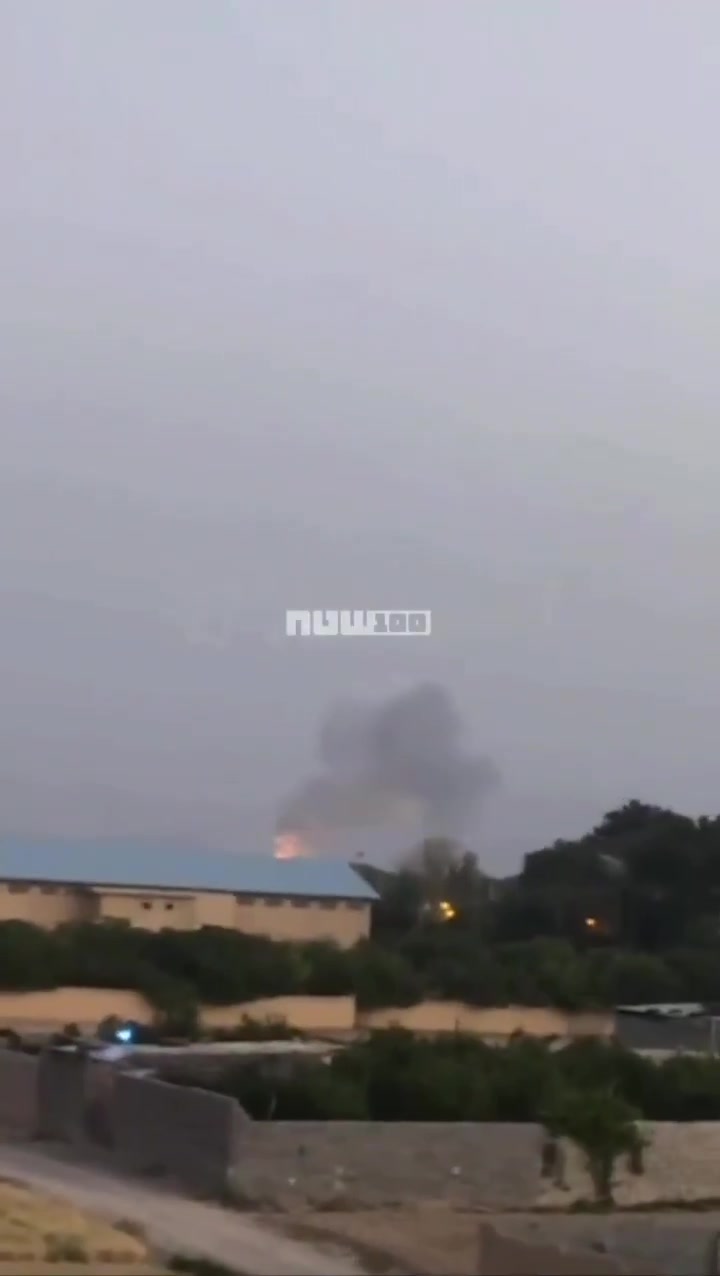 Smoke billows from the reported site of an Israeli strike in Isfahan, Iran