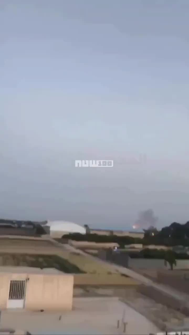 Smoke billows from the reported site of an Israeli strike in Isfahan, Iran