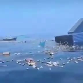Unverified footage of a container ship sinking and containers floating afterward
