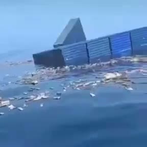 Unverified footage of a container ship sinking and containers floating afterward